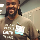 Darren rocking an Earth to Love shirt